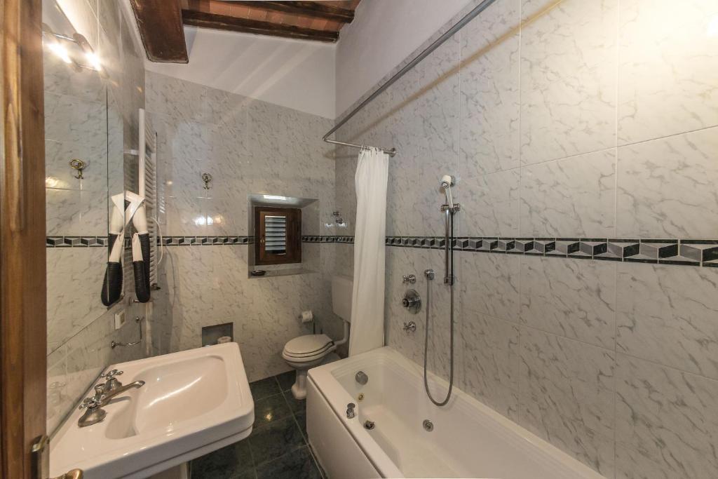 Гостьовий будинок Relais Santa Cristina Радда-ін-К'янті Номер фото