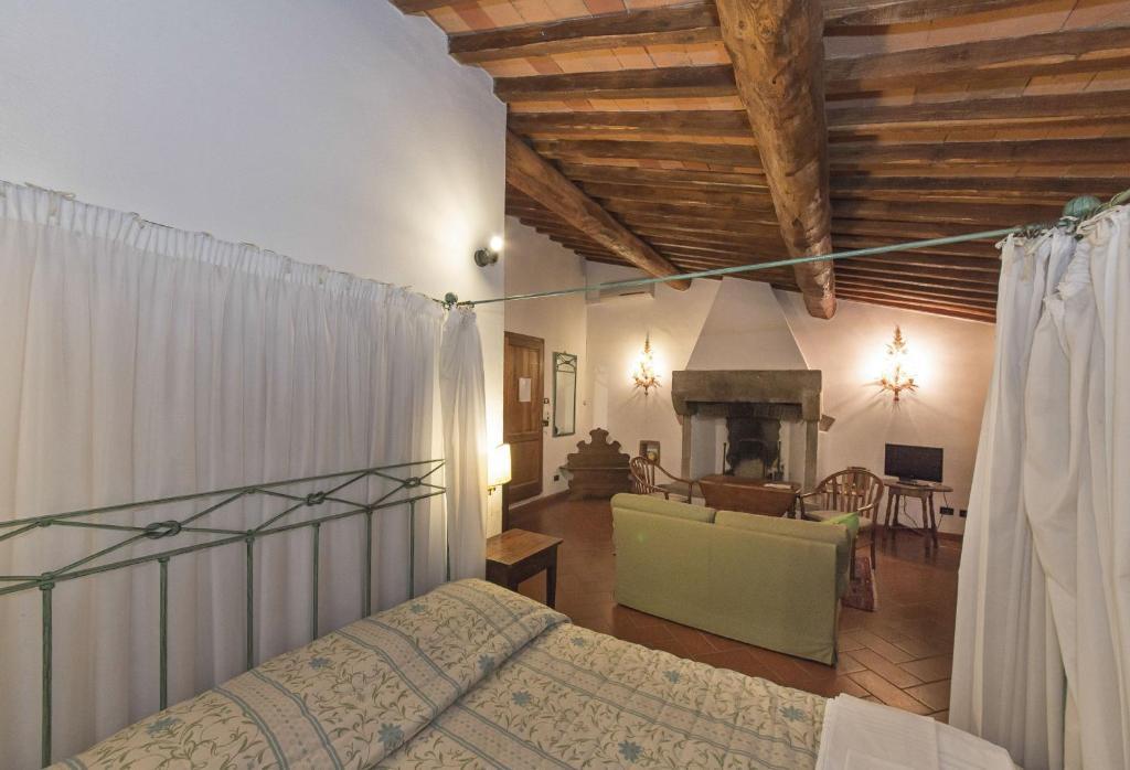 Гостьовий будинок Relais Santa Cristina Радда-ін-К'янті Номер фото