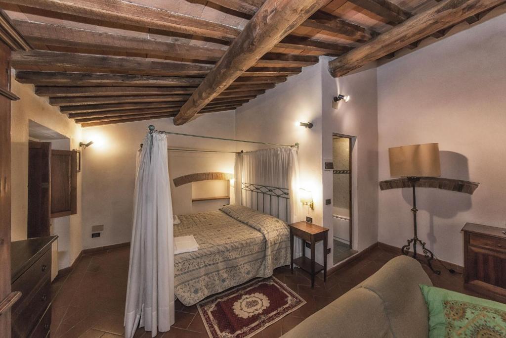 Гостьовий будинок Relais Santa Cristina Радда-ін-К'янті Номер фото
