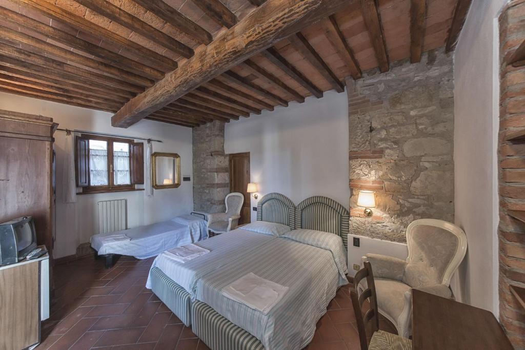 Гостьовий будинок Relais Santa Cristina Радда-ін-К'янті Номер фото