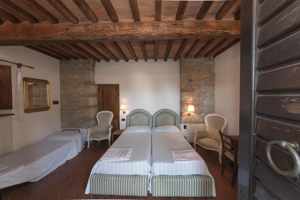 Гостьовий будинок Relais Santa Cristina Радда-ін-К'янті Номер фото