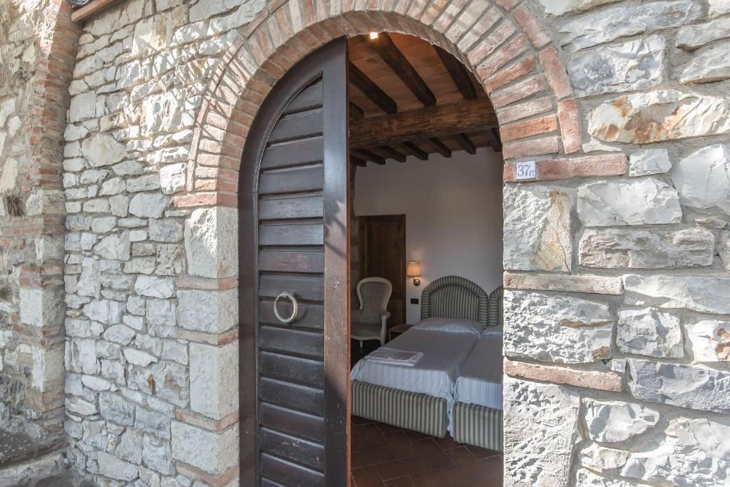 Гостьовий будинок Relais Santa Cristina Радда-ін-К'янті Номер фото